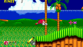 Knuckles wanders through Emerald Hill. Jump and then hold jump again to glide.