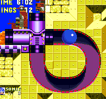 At the end of long slopes, short tubes looping inside the ground will throw players straight up long walls and through barriers in the floor of the level above, or even into another tube loop.